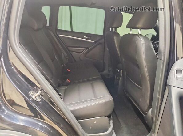 WVGAV7AX2GW067339 2016 VOLKSWAGEN TIGUAN Black Rear interior view