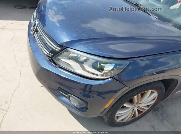 WVGAV7AX3GW557269 2016 VOLKSWAGEN TIGUAN Dark Blue 
