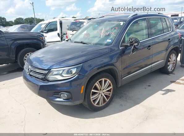 WVGAV7AX3GW557269 2016 VOLKSWAGEN TIGUAN Dark Blue 