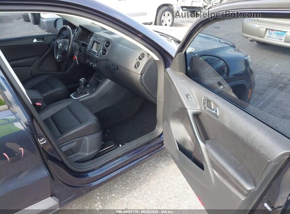 WVGAV7AX4GW599157 2016 VOLKSWAGEN TIGUAN Blue Vista interior delantera