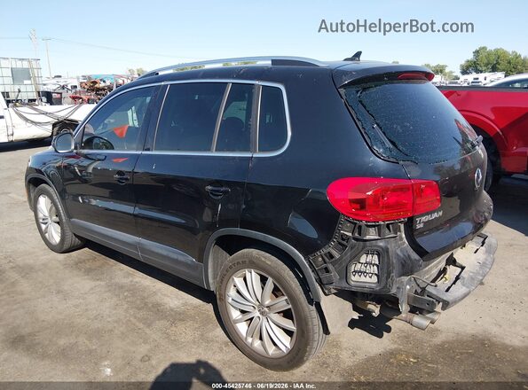 WVGAV7AX5GW528324 2016 VOLKSWAGEN TIGUAN Black Tył lewy