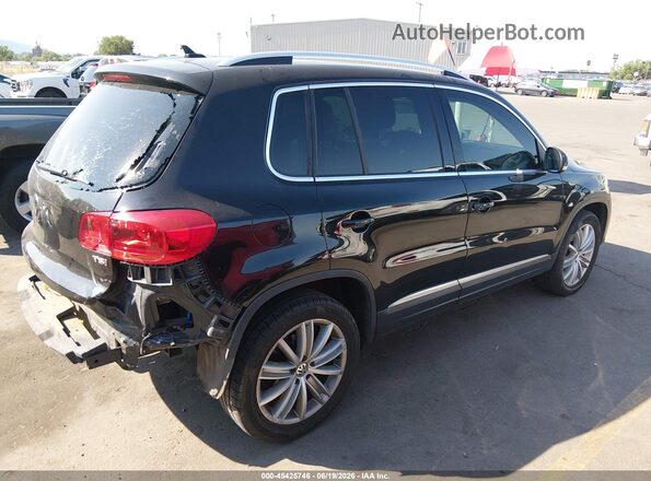 WVGAV7AX5GW528324 2016 VOLKSWAGEN TIGUAN Black Tył prawy