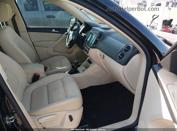 WVGAV7AX5GW528324 2016 VOLKSWAGEN TIGUAN Black Widok wnętrza z przodu