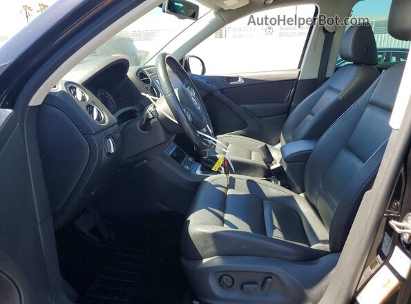 WVGAV7AX7GW577444 2016 VOLKSWAGEN TIGUAN Black წინა სალონის ხედი