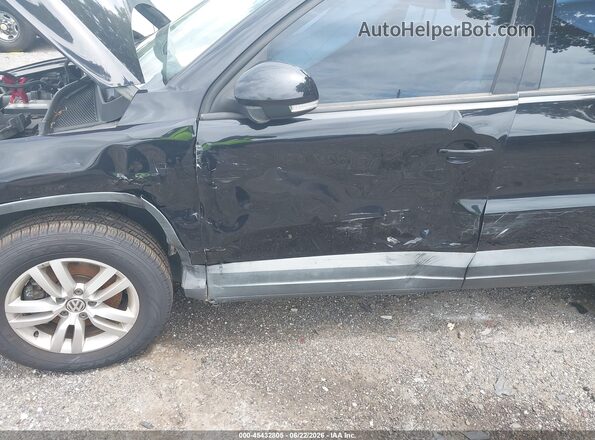 WVGAV7AX7GW581011 2016 VOLKSWAGEN TIGUAN Black წინა ხედი