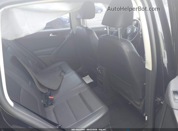 WVGAV7AX7GW581011 2016 VOLKSWAGEN TIGUAN Black VIN კოდის სტიკერის ხედი