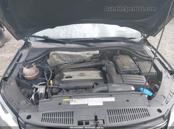 WVGAV7AX7GW581011 2016 VOLKSWAGEN TIGUAN Black უკანა ხედი