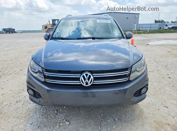 WVGAV7AX8GW557669 2016 VOLKSWAGEN TIGUAN Gray Front view