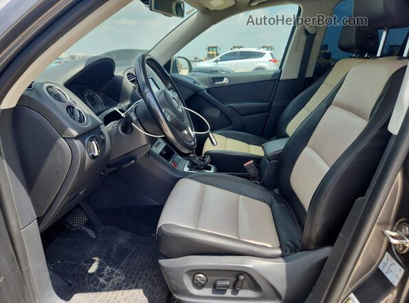 WVGAV7AX8GW557669 2016 VOLKSWAGEN TIGUAN Gray Front interior view