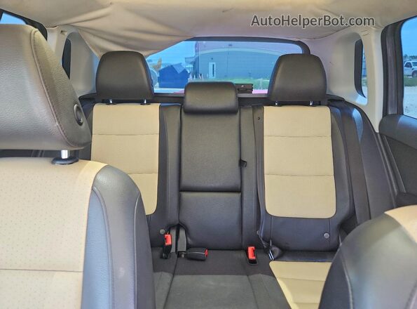 WVGAV7AX8GW557669 2016 VOLKSWAGEN TIGUAN Gray Rear seats view