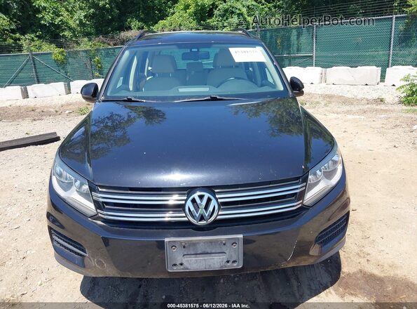 WVGAV7AX9GW604806 2016 VOLKSWAGEN TIGUAN Black 
