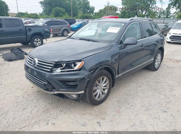 WVGEF9BP2GD010336 2016 VOLKSWAGEN TOUAREG Black Front left