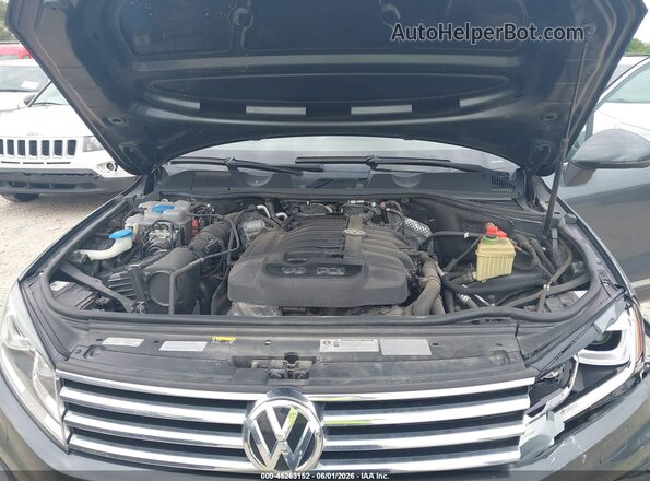 WVGEF9BP2GD010336 2016 VOLKSWAGEN TOUAREG Black Rear view