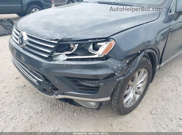 WVGEF9BP2GD010336 2016 VOLKSWAGEN TOUAREG Black Front view