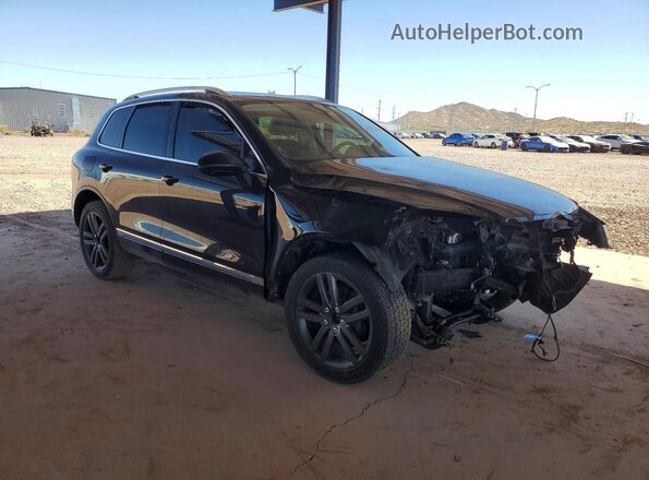WVGEF9BP4GD009916 2016 VOLKSWAGEN TOUAREG Black Front right