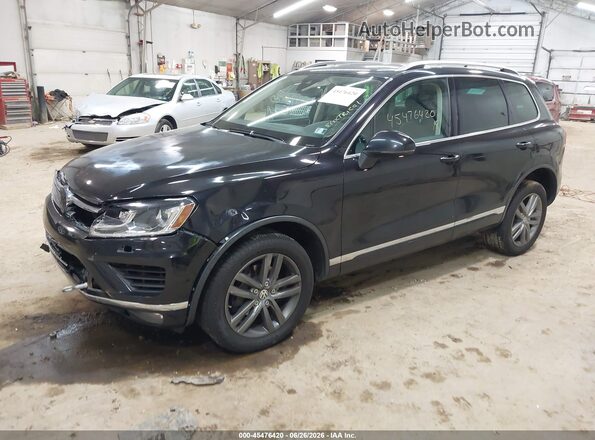 WVGEF9BP6GD001543 2016 VOLKSWAGEN TOUAREG Black Vista tres cuartos delantera izquierda