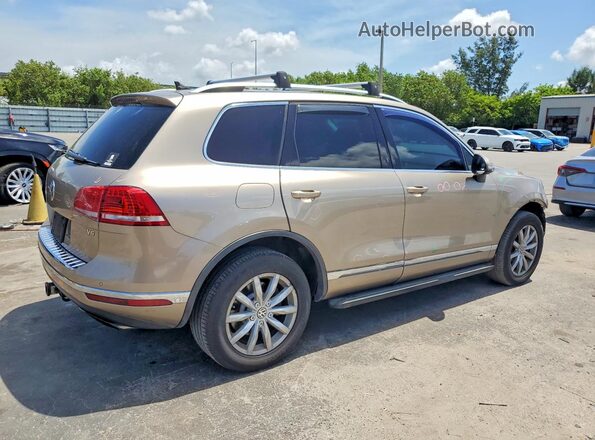 WVGEF9BP7GD010218 2016 VOLKSWAGEN TOUAREG Желто-коричневый 