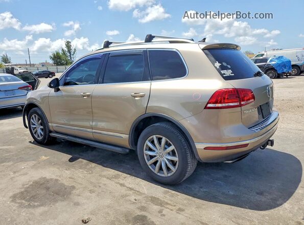 WVGEF9BP7GD010218 2016 VOLKSWAGEN TOUAREG Желто-коричневый 