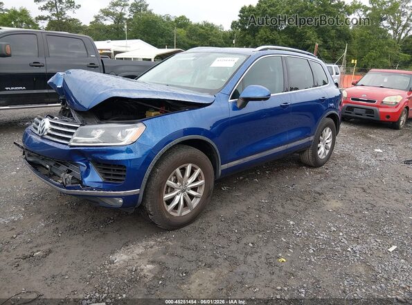 WVGEF9BP8GD004931 2016 VOLKSWAGEN TOUAREG Blue Առջևի ձախ երեք քառորդ տեսարան