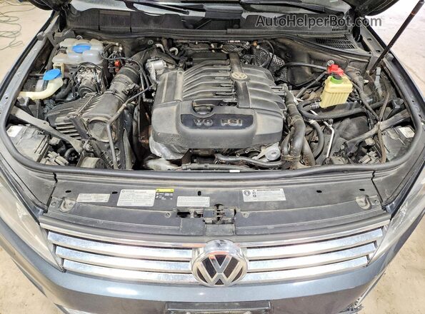 WVGEF9BP9GD011449 2016 VOLKSWAGEN TOUAREG Gray Vista del compartimento del motor
