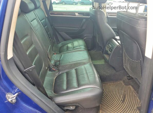 WVGEP9BP0GD003737 2016 VOLKSWAGEN TOUAREG Blue Rear interior view