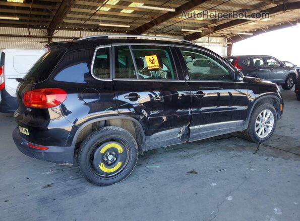 WVGRV7AX1HK002722 2017 VOLKSWAGEN TIGUAN Black Rear right