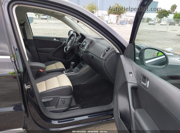 WVGRV7AX4HK003203 2017 VOLKSWAGEN TIGUAN Черный Вид салона спереди