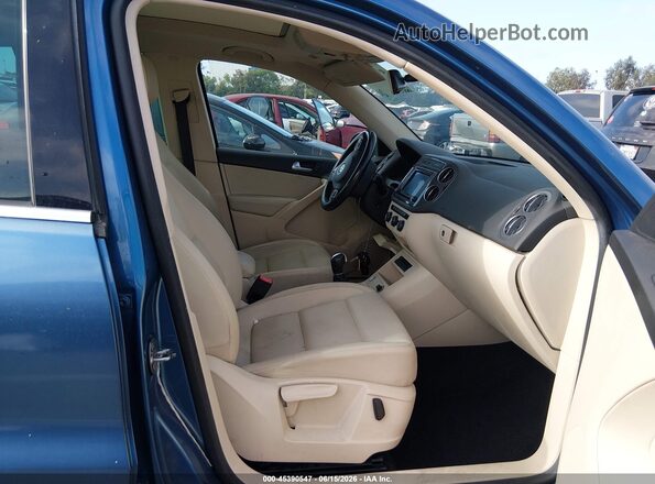 WVGRV7AX4HW502480 2017 VOLKSWAGEN TIGUAN Blue Widok wnętrza z przodu