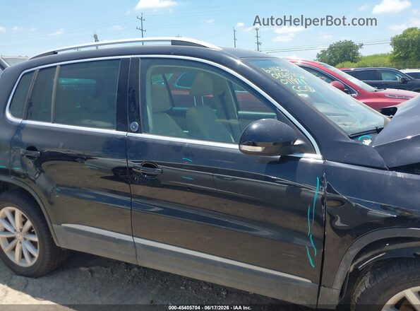 WVGRV7AX6HK011979 2017 VOLKSWAGEN TIGUAN Черный Вид задней части салона