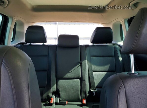 WVGRV7AX9HK019574 2017 VOLKSWAGEN TIGUAN Black Rear seats view