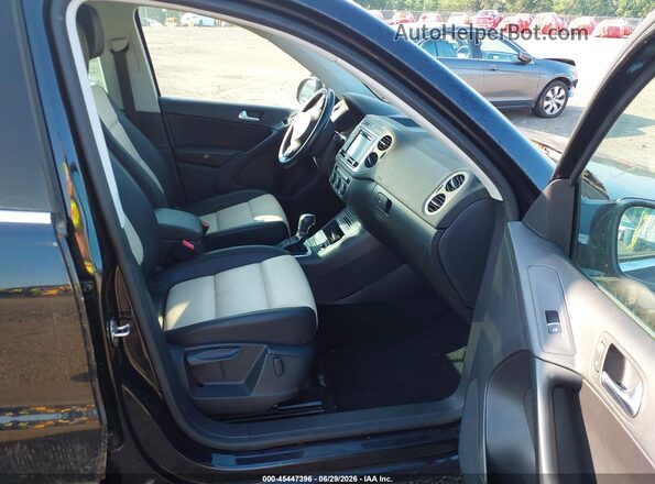 WVGSV7AX0HK003846 2017 VOLKSWAGEN TIGUAN Черный Вид салона спереди