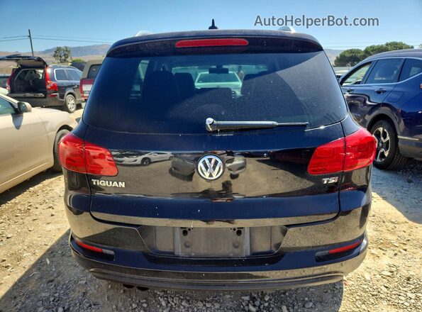 WVGTV7AX1HK018389 2017 VOLKSWAGEN TIGUAN Black Rear view