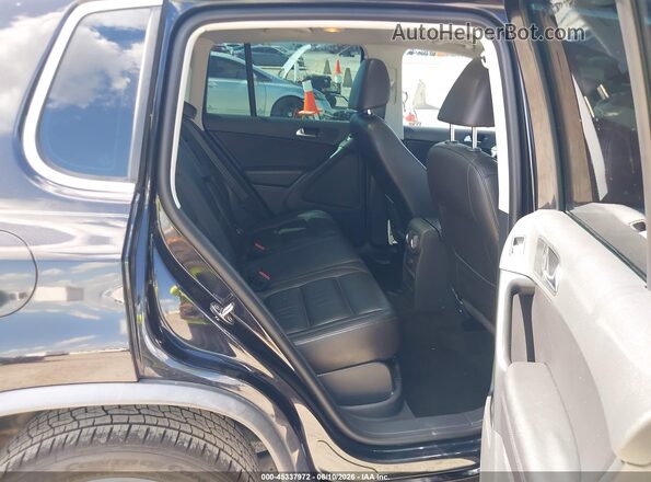 WVGTV7AX4HW507202 2017 VOLKSWAGEN TIGUAN Black VIN კოდის სტიკერის ხედი