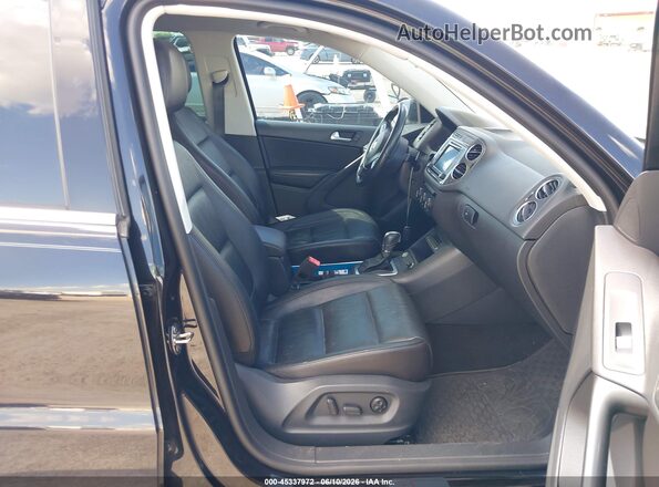 WVGTV7AX4HW507202 2017 VOLKSWAGEN TIGUAN Black წინა სალონის ხედი
