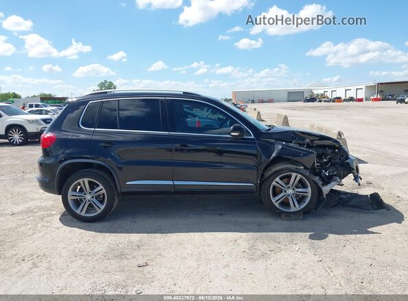 WVGTV7AX4HW507202 2017 VOLKSWAGEN TIGUAN Black უკანა სალონის ხედი