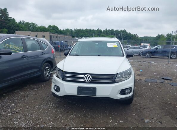 WVGUV7AX0HK031154 2017 VOLKSWAGEN TIGUAN Белый Вид панели приборов