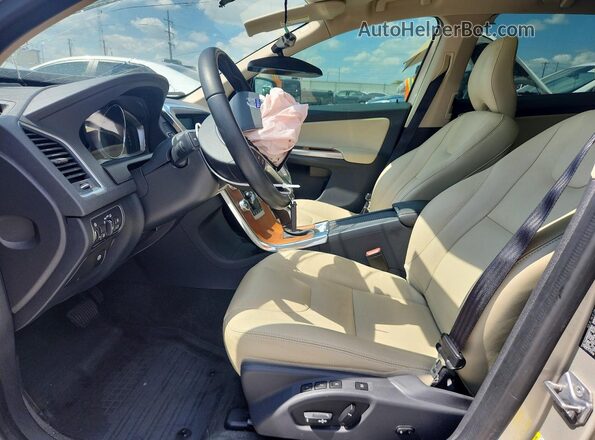 YV440MDU5H2121044 2017 VOLVO XC60 Cream Front interior view