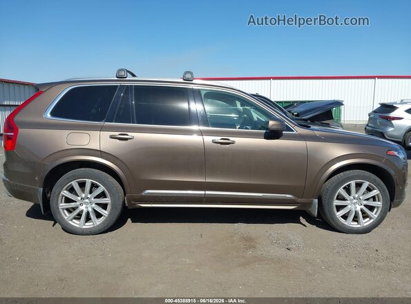 YV4BC0PLXG1052611 2016 VOLVO XC90 HYBRID Brown Rear interior view