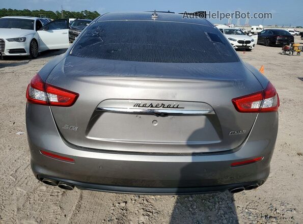 ZAM57YTA9J1278584 2018 MASERATI GHIBLI Silver Rear view