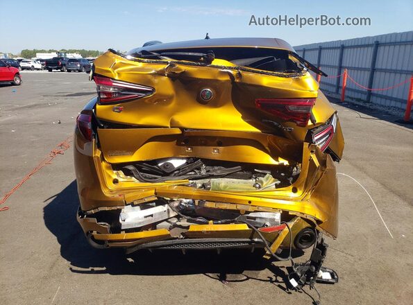 ZASPAKBN0P7D57882 2023 ALFA ROMEO STELVIO Золотой Вид сзади