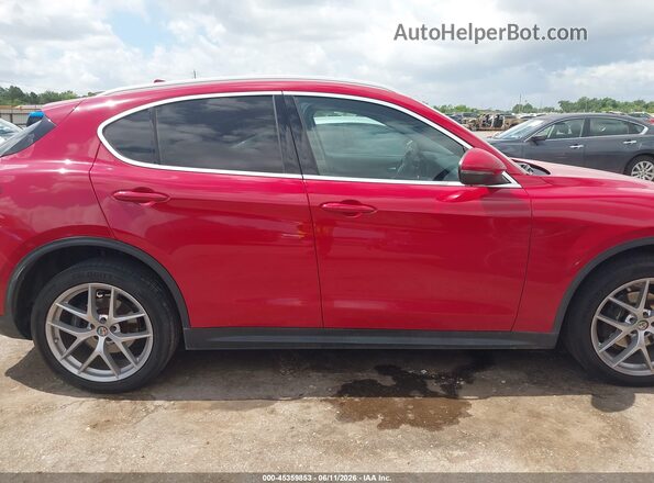 ZASPAKBN6K7C31308 2019 ALFA ROMEO STELVIO Red Rear interior view