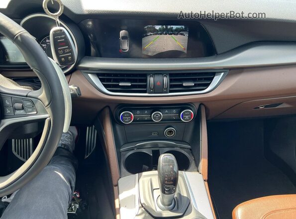 ZASPAKBN7K7C71882 2019 ALFA ROMEO STELVIO Blue Vista de los asientos traseros