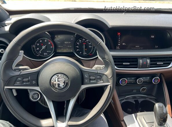 ZASPAKBN7K7C71882 2019 ALFA ROMEO STELVIO Blue Vista interior delantera