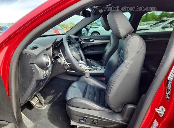 ZASPAKBN9P7D55516 2023 ALFA ROMEO STELVIO Red Front interior view