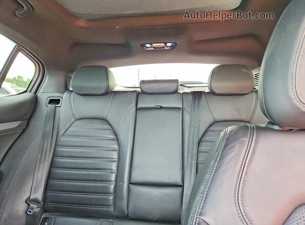 ZASPAKBN9P7D55516 2023 ALFA ROMEO STELVIO Red Rear seats view