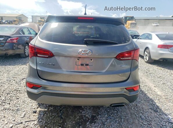 5XYZT3LB6JG557830 2018 HYUNDAI SANTA Gray Widok wnętrza z przodu