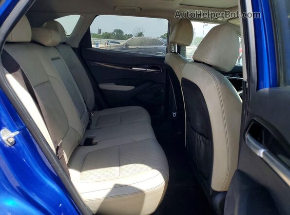 KNDERCAA1M7130001 2021 KIA SELTOS Blue Vista de los asientos traseros