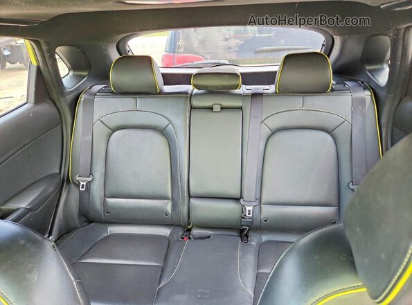 KM8K5CA57JU069294 2018 HYUNDAI KONA Green Rear interior view