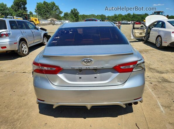 JTNB11HK9J3051459 2018 TOYOTA CAMRY Серебряный Вид салона спереди