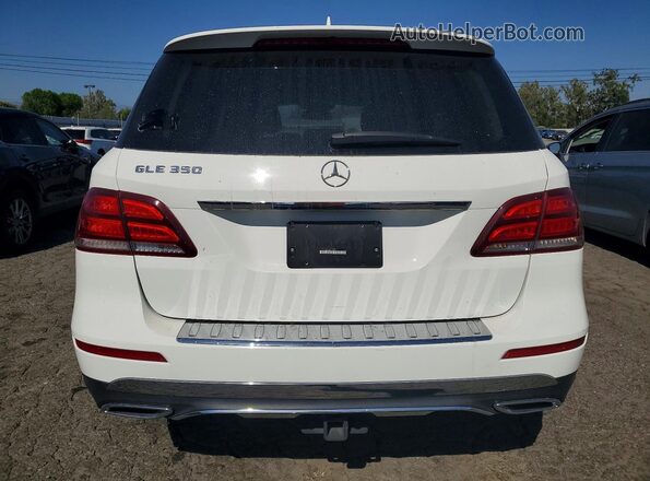 4JGDA5JB8JB071699 2018 MERCEDES-BENZ GLE-CLASS White Front interior view